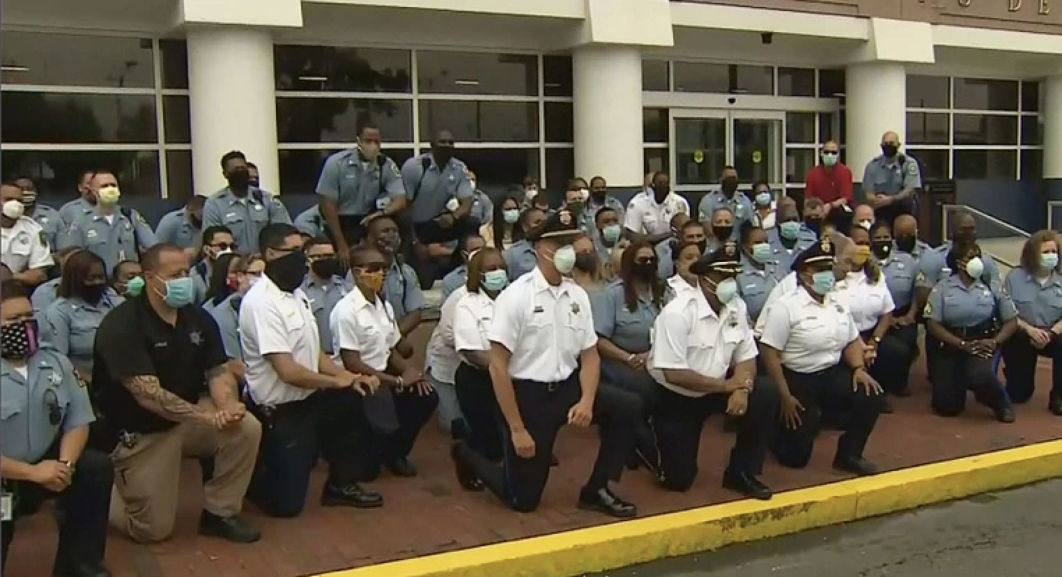 ‘Our Rosa Parks Moment’: Sheriff Tompkins Kneels In Solidarity With Protesters