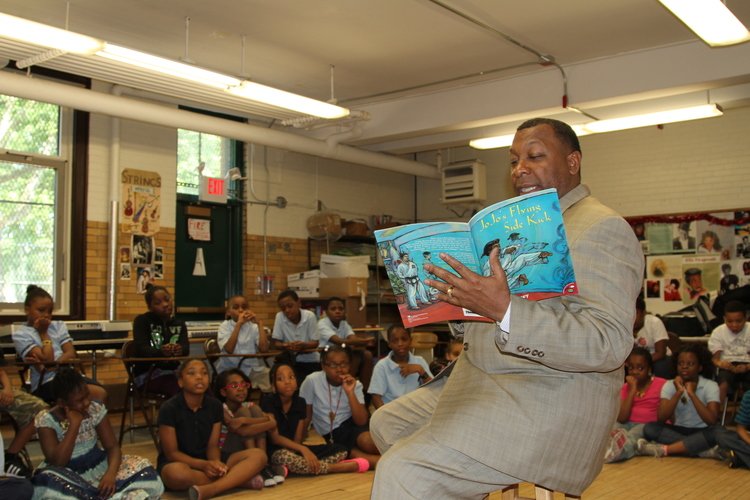 Sheriff+Tompkins+reading+book+at+channing+school.jpeg